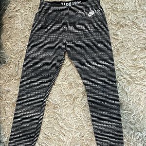 Nike black & white striped cloth leggings.